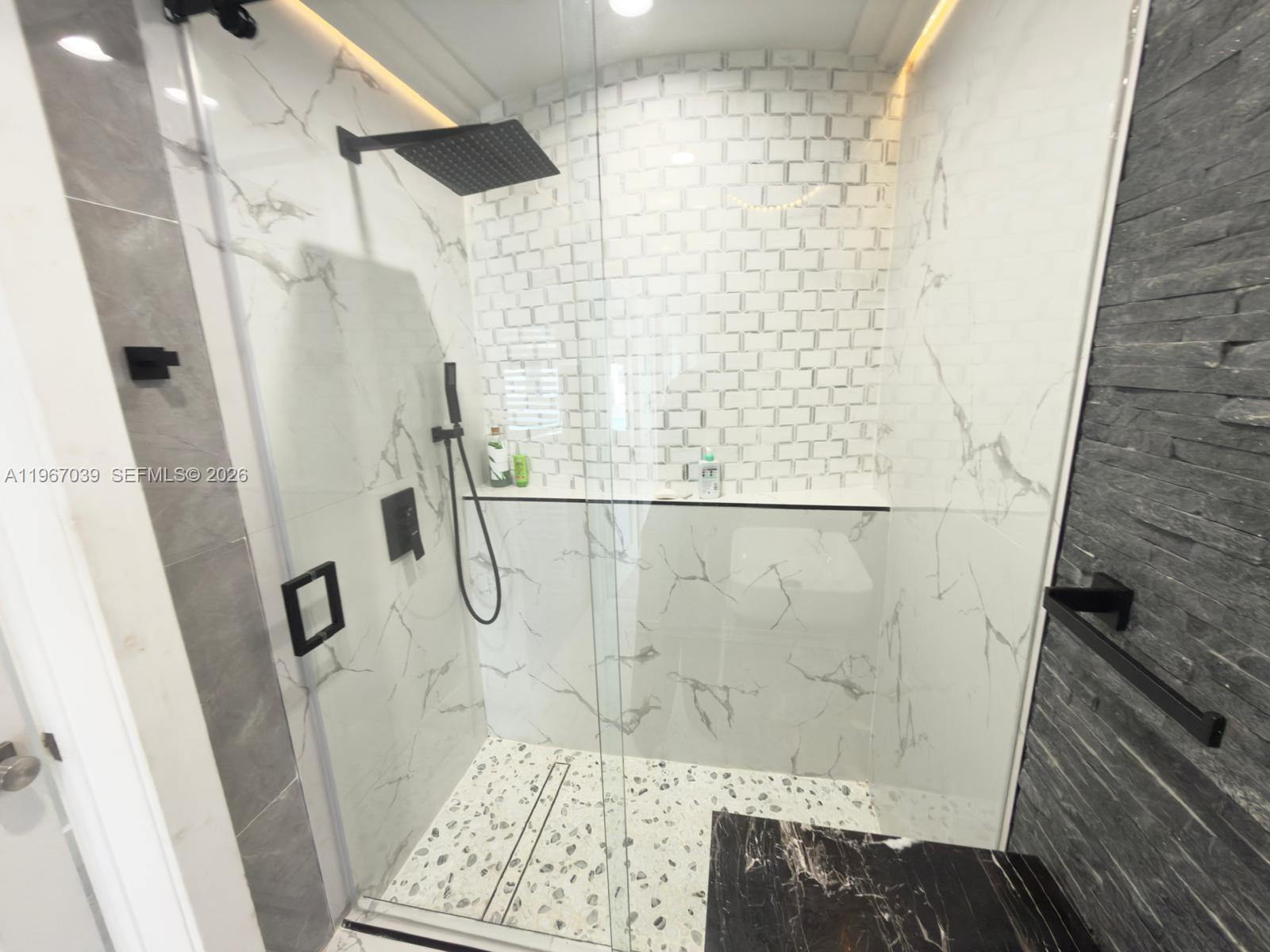 4801 West Park Road Hollywood, FL 33021 - Photo 19 of 30 a bathroom with a shower