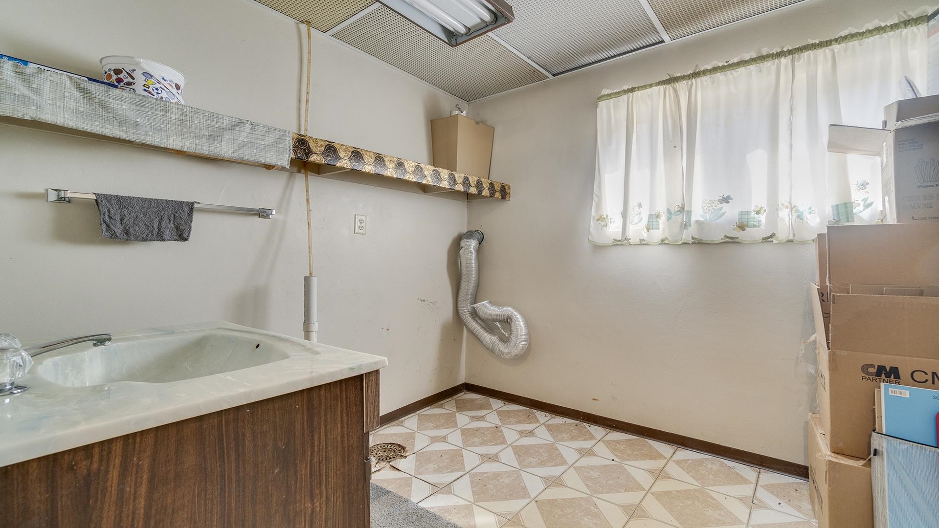 809 North Alpine Road Rockford, IL 61107 - Photo 24 of 48 a bathroom with a granite countertop sink and a mirror