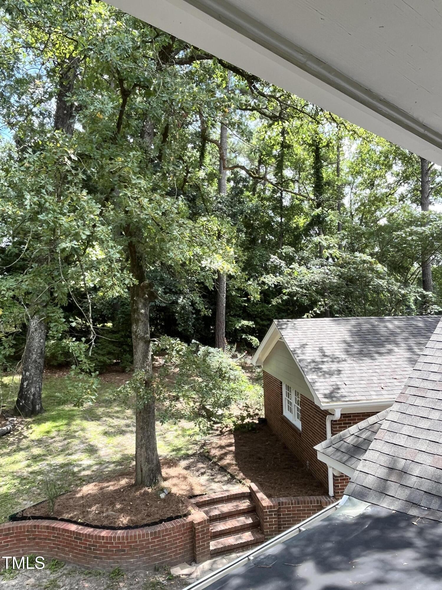 120 Dundee Road Fayetteville, NC 28303 - Photo 23 of 32 a view of a house with a yard