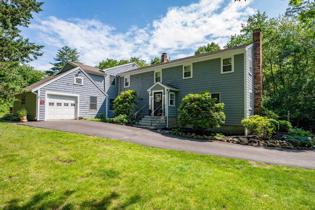 79 North Street Hanover, MA 02339 - Photo 1 of 42 a front view of house with a garden