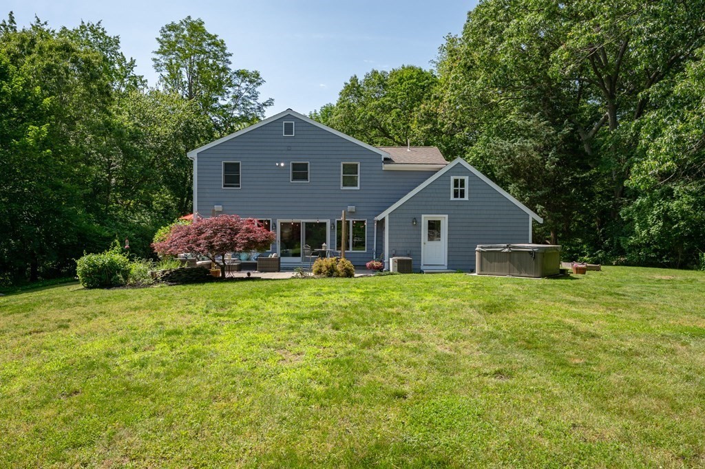 79 North Street Hanover, MA 02339 - Photo 32 of 42 a front view of house with yard and green space
