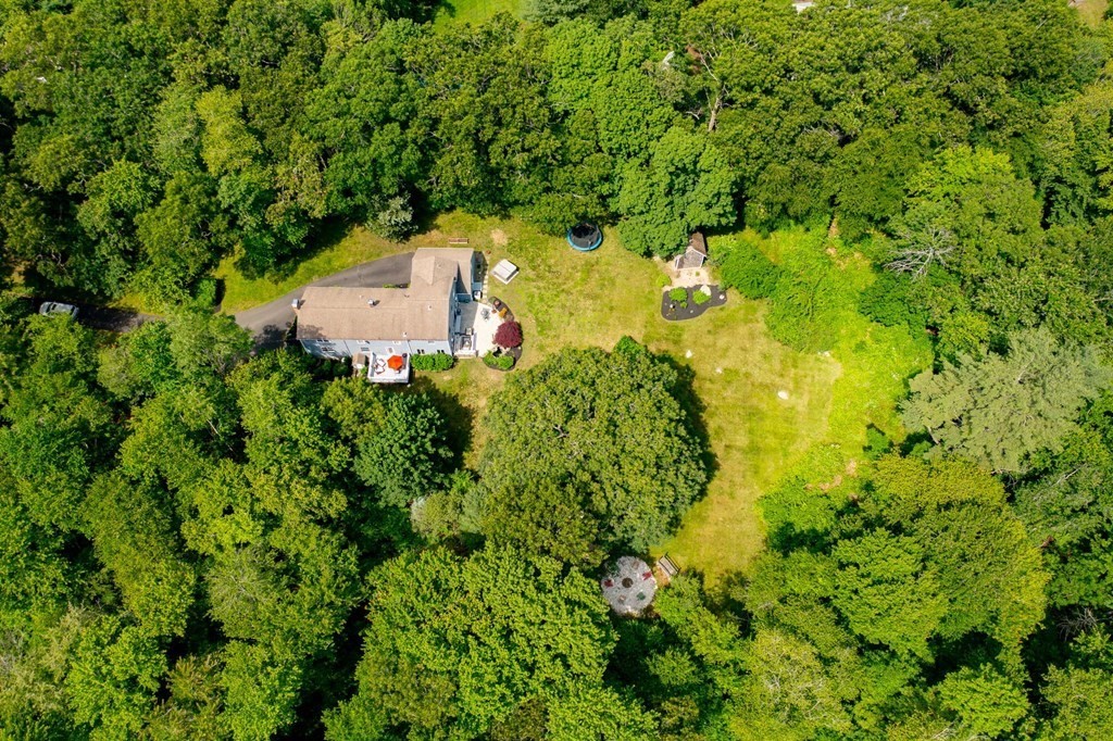 79 North Street Hanover, MA 02339 - Photo 38 of 42 an aerial view of a house with a yard