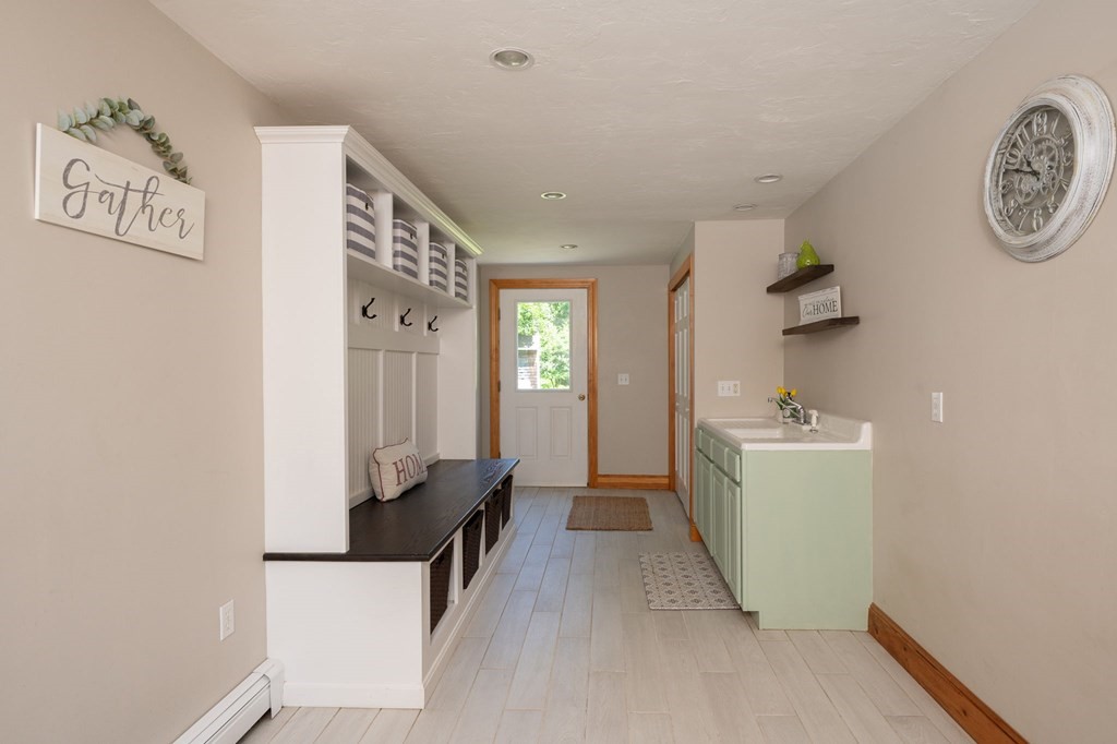 79 North Street Hanover, MA 02339 - Photo 6 of 42 a room with a window and a table