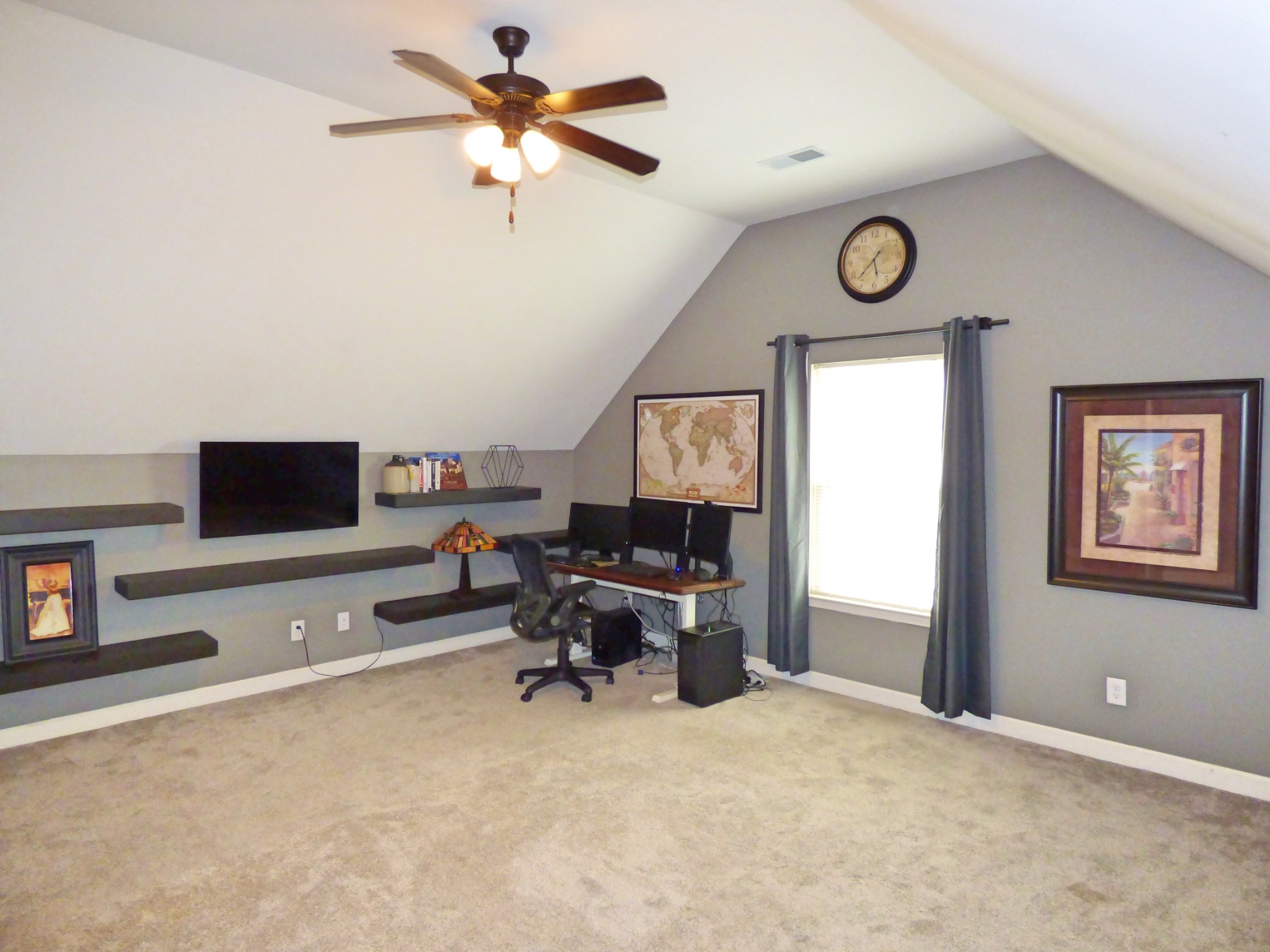 1076 Golf View Way Spring Hill, TN 37174 - Photo 14 of 19 a view of a livingroom with workspace and a window