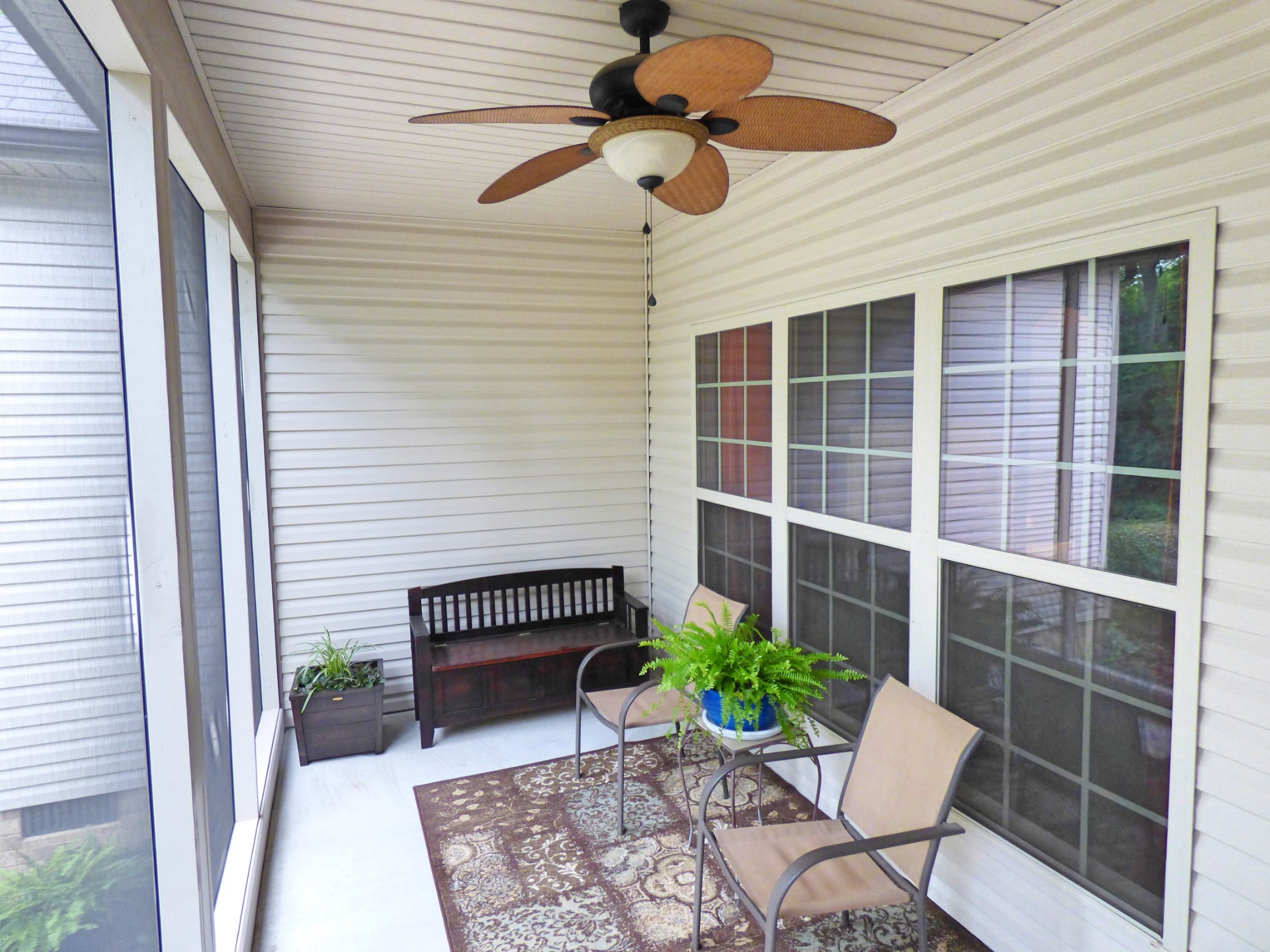 1076 Golf View Way Spring Hill, TN 37174 - Photo 16 of 19 a balcony view with a potted plant and a bench