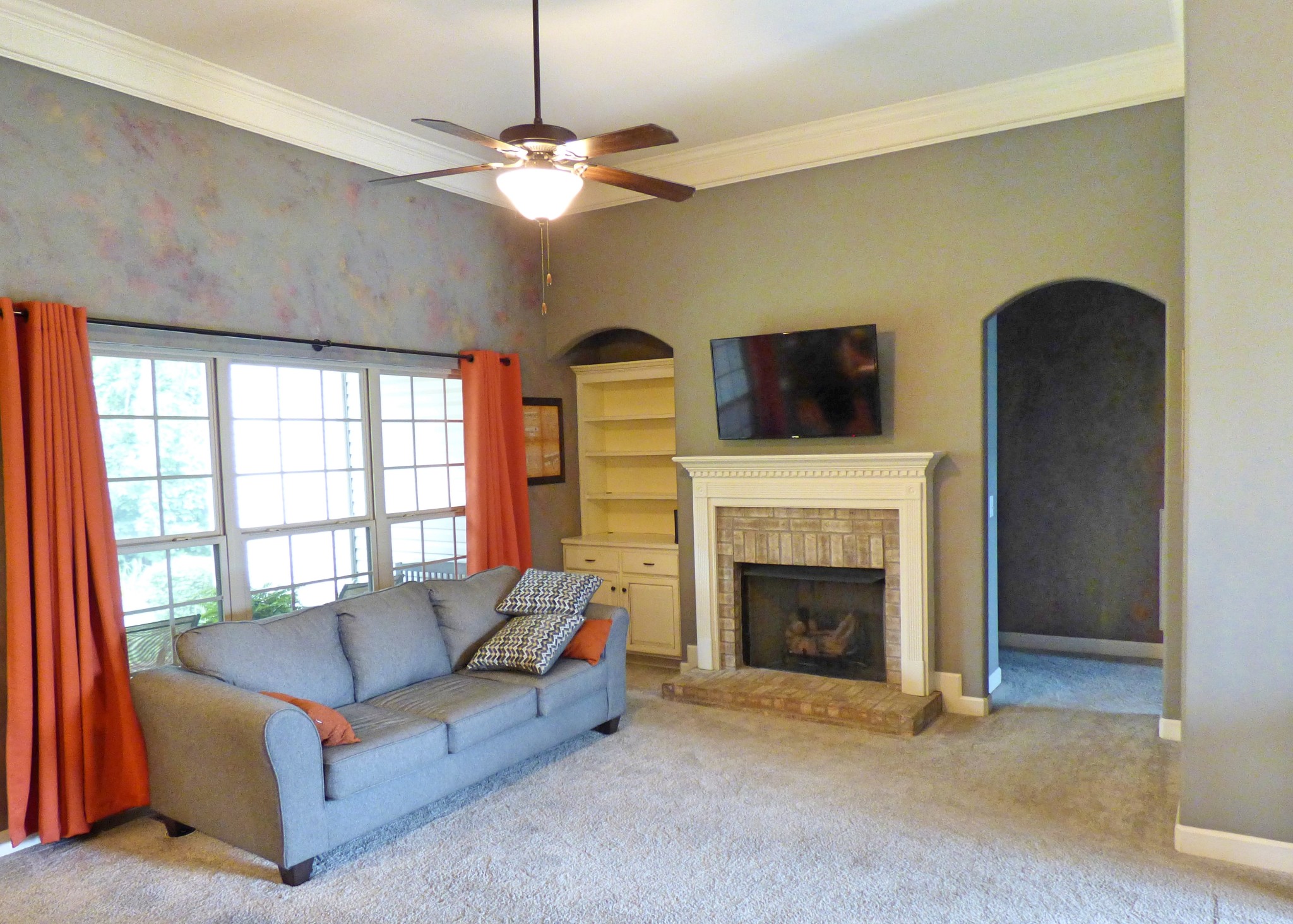 1076 Golf View Way Spring Hill, TN 37174 - Photo 3 of 19 a living room with furniture and a fireplace