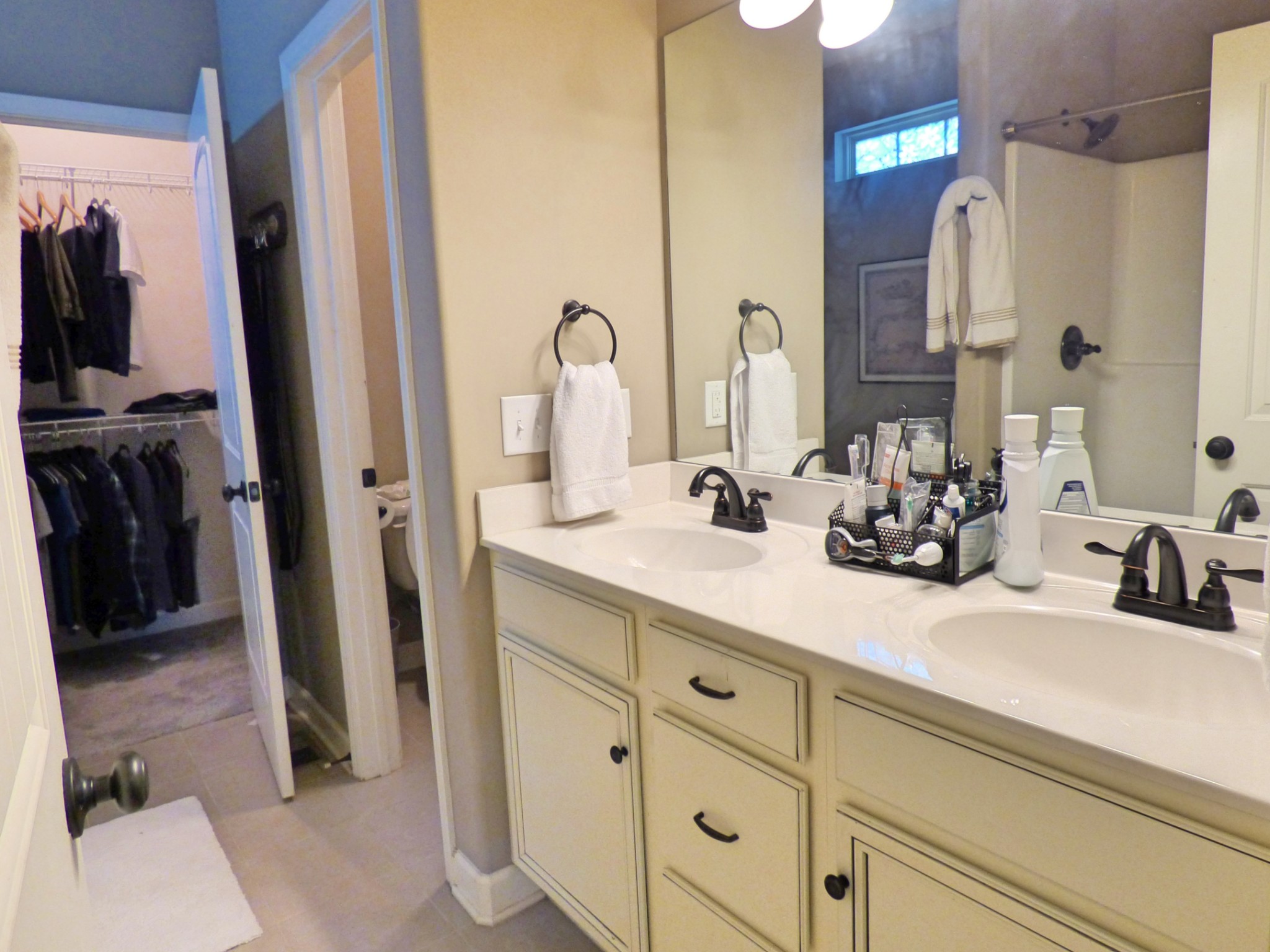 1076 Golf View Way Spring Hill, TN 37174 - Photo 10 of 19 a bathroom with cabinets and a sink