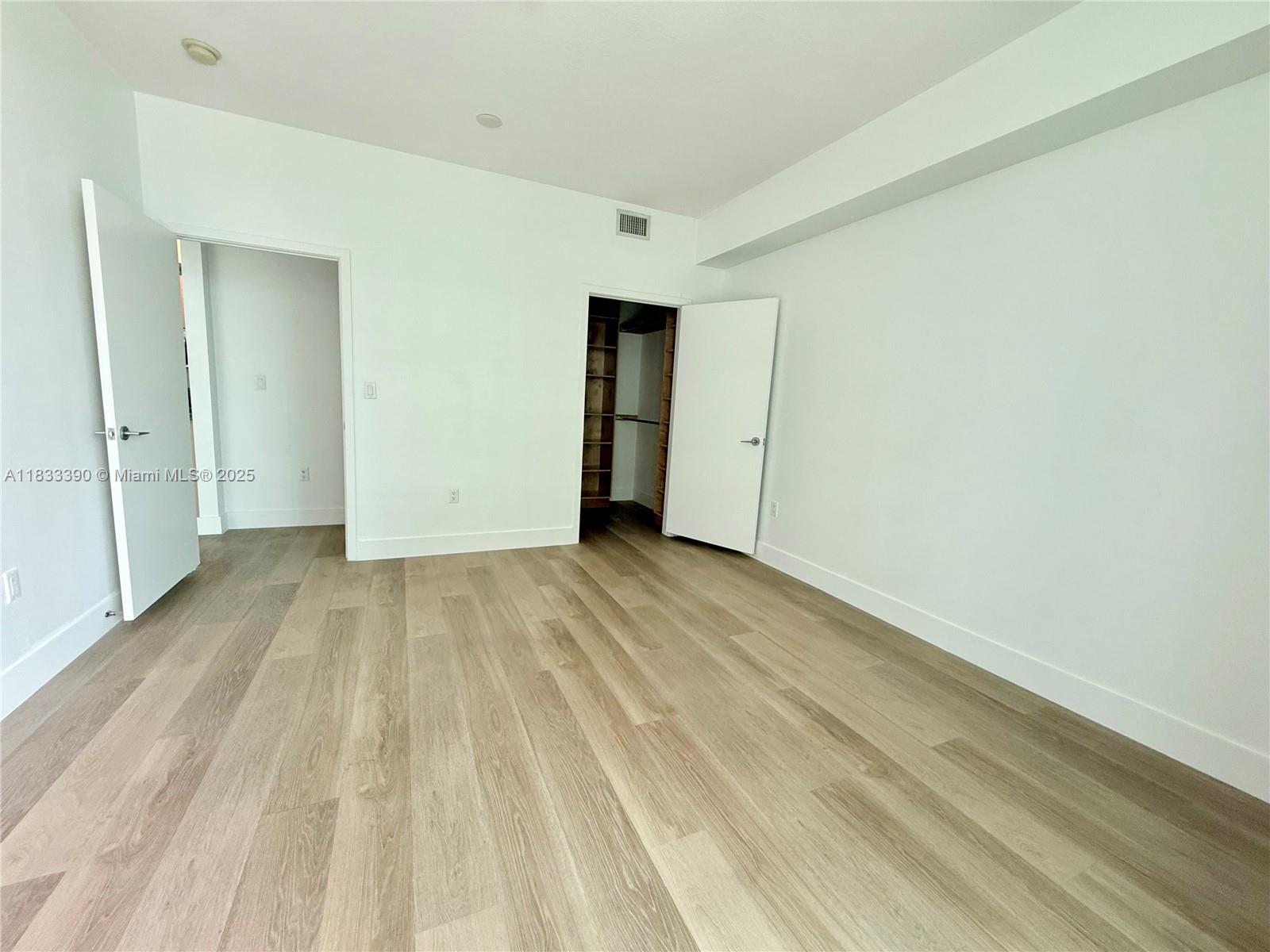 Brickell Miami, FL 33130 - Photo 10 of 15 a view of an empty room and wooden floor