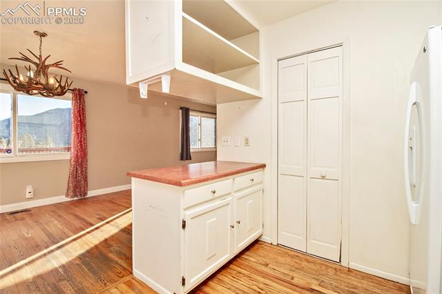 4595 Fox Road Cascade, CO 80809 - Photo 20 of 38 Kitchen looking into dining and great room