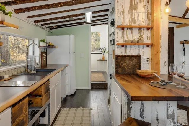 a bedroom with a bed and a fireplace