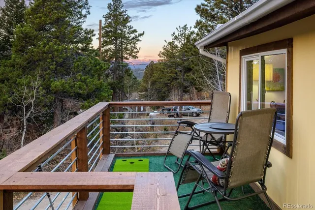 a view of a yard with large trees