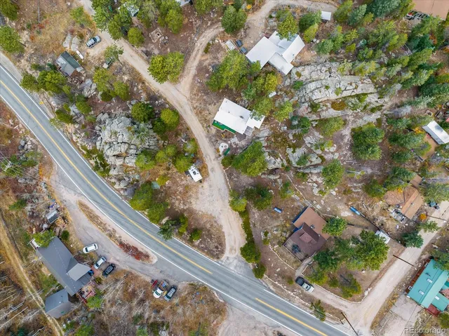 a view of a city with mountains in the background