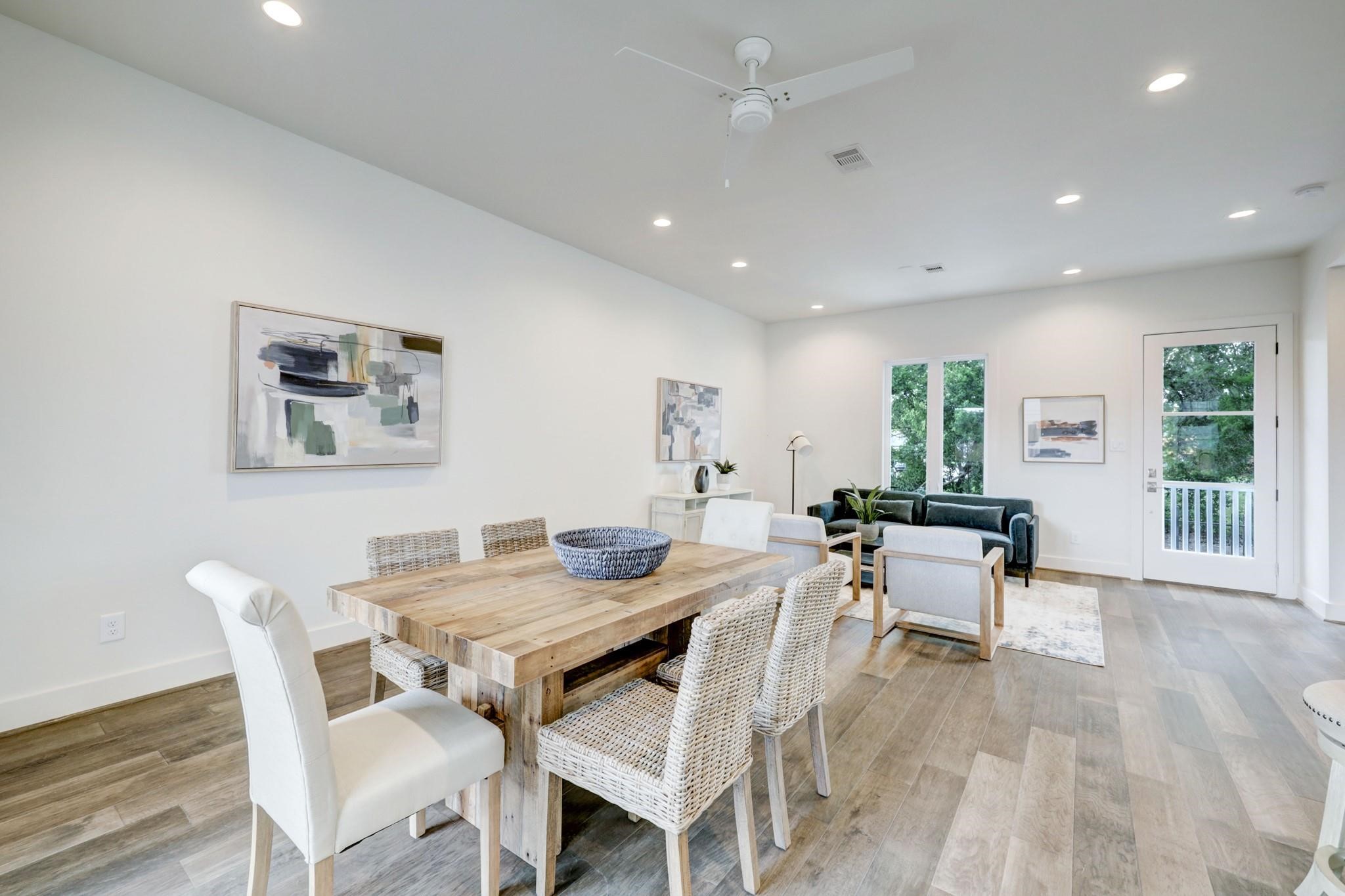 3827 Arlington Street Houston, TX 77018 - Photo 8 of 39 Dining area features light wood flooring, neutral walls, and recessed lighting.