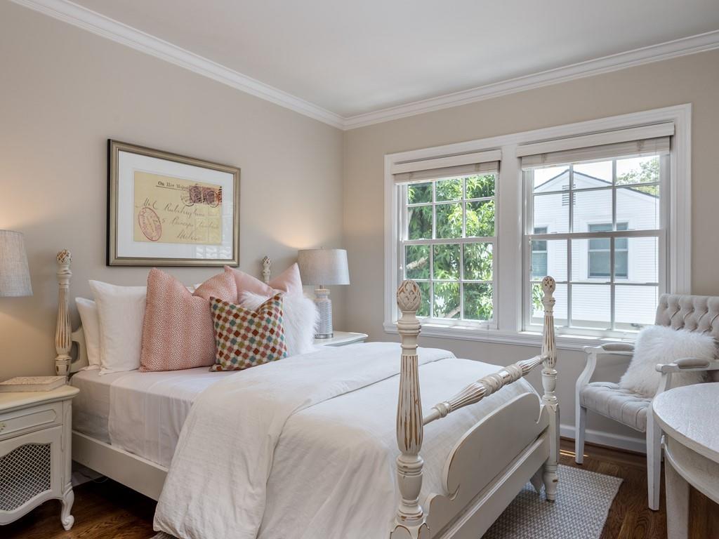 820 Crescent Avenue San Mateo, CA 94401 - Photo 17 of 27 a bedroom with a large bed and a large window