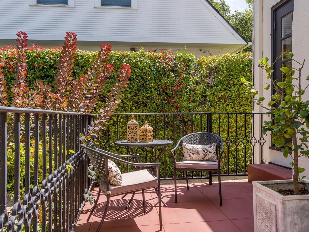 820 Crescent Avenue San Mateo, CA 94401 - Photo 22 of 27 a couple of chairs sitting in a roof deck with wooden fence