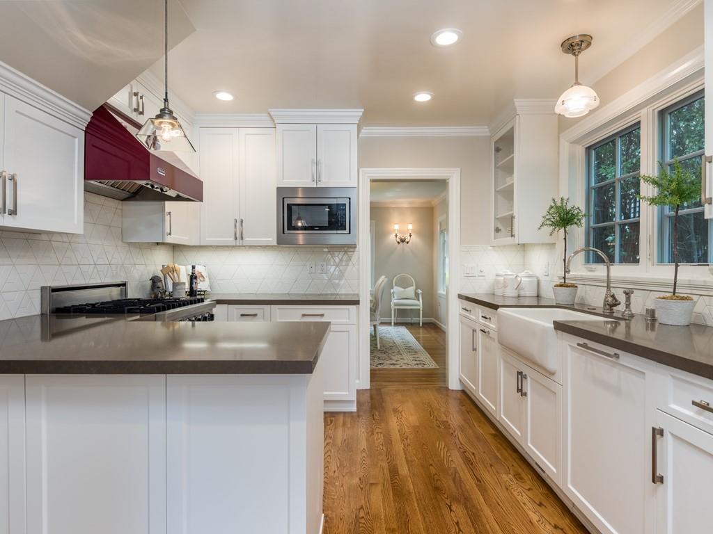 820 Crescent Avenue San Mateo, CA 94401 - Photo 6 of 27 a kitchen with stainless steel appliances granite countertop a sink a stove and a refrigerator