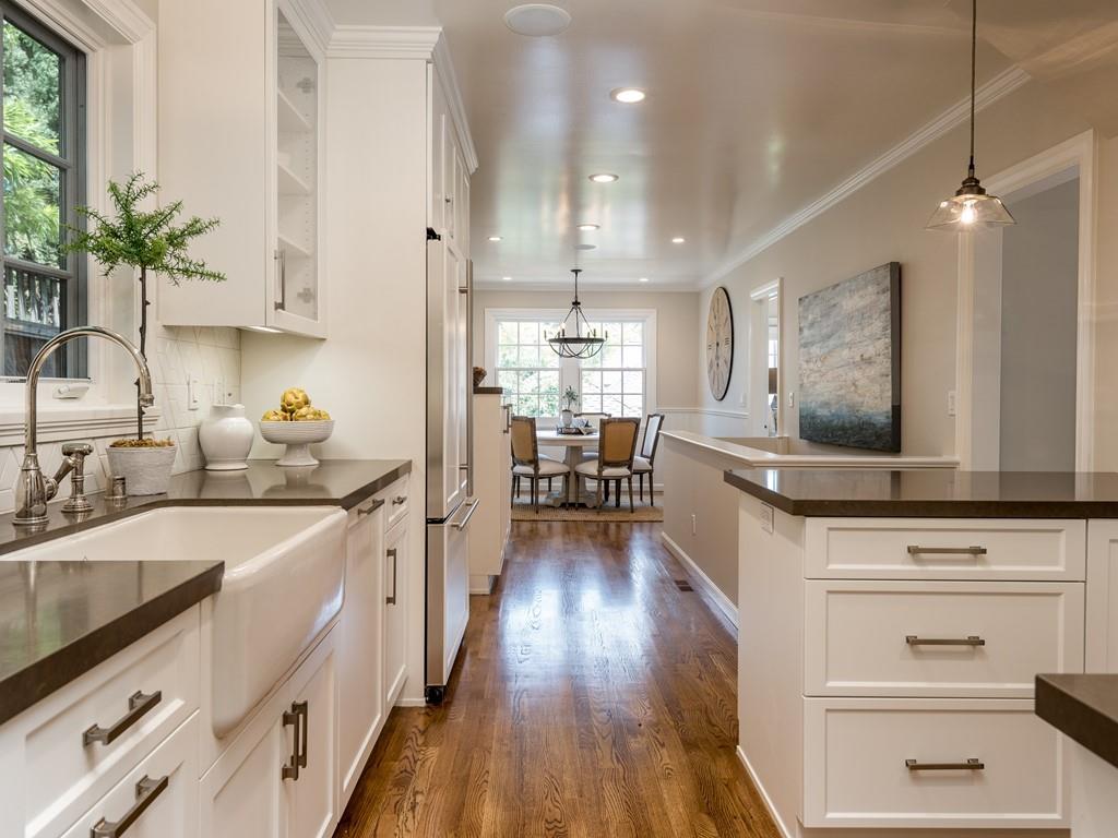 820 Crescent Avenue San Mateo, CA 94401 - Photo 8 of 27 a kitchen with granite countertop a sink appliances cabinets and wooden floor
