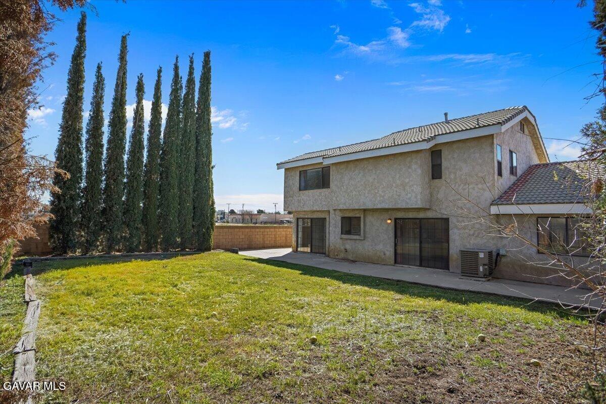 5101 Ruby Court Quartz Hill, CA 93536 - Photo 20 of 24 21-Backyard to House Looking SE