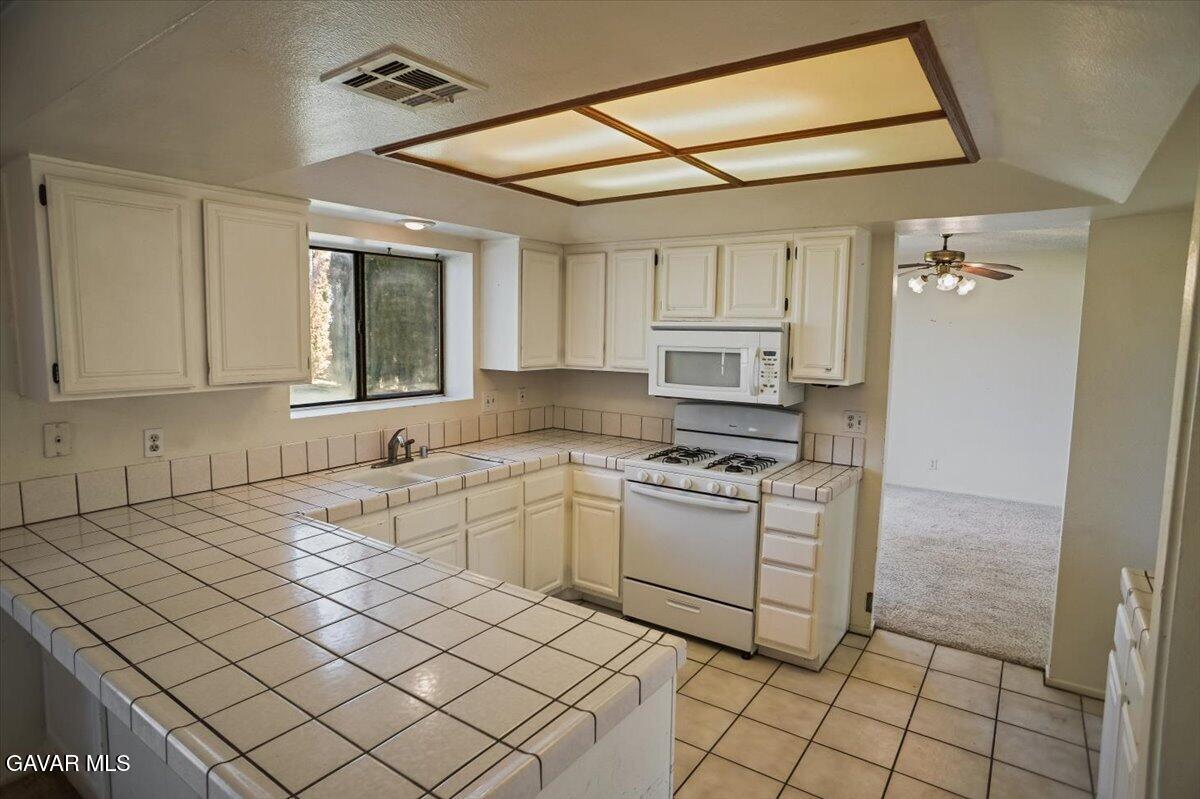 5101 Ruby Court Quartz Hill, CA 93536 - Photo 7 of 24 07-Kitchen