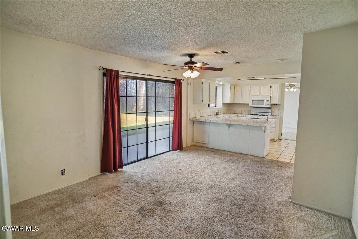 5101 Ruby Court Quartz Hill, CA 93536 - Photo 9 of 24 09-Family to Kitchen