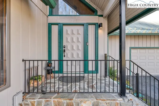 a view of a balcony with wooden floor