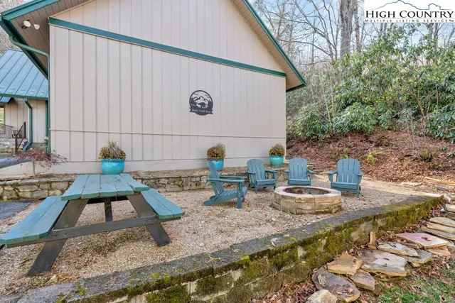 swimming pool view with a outdoor seating