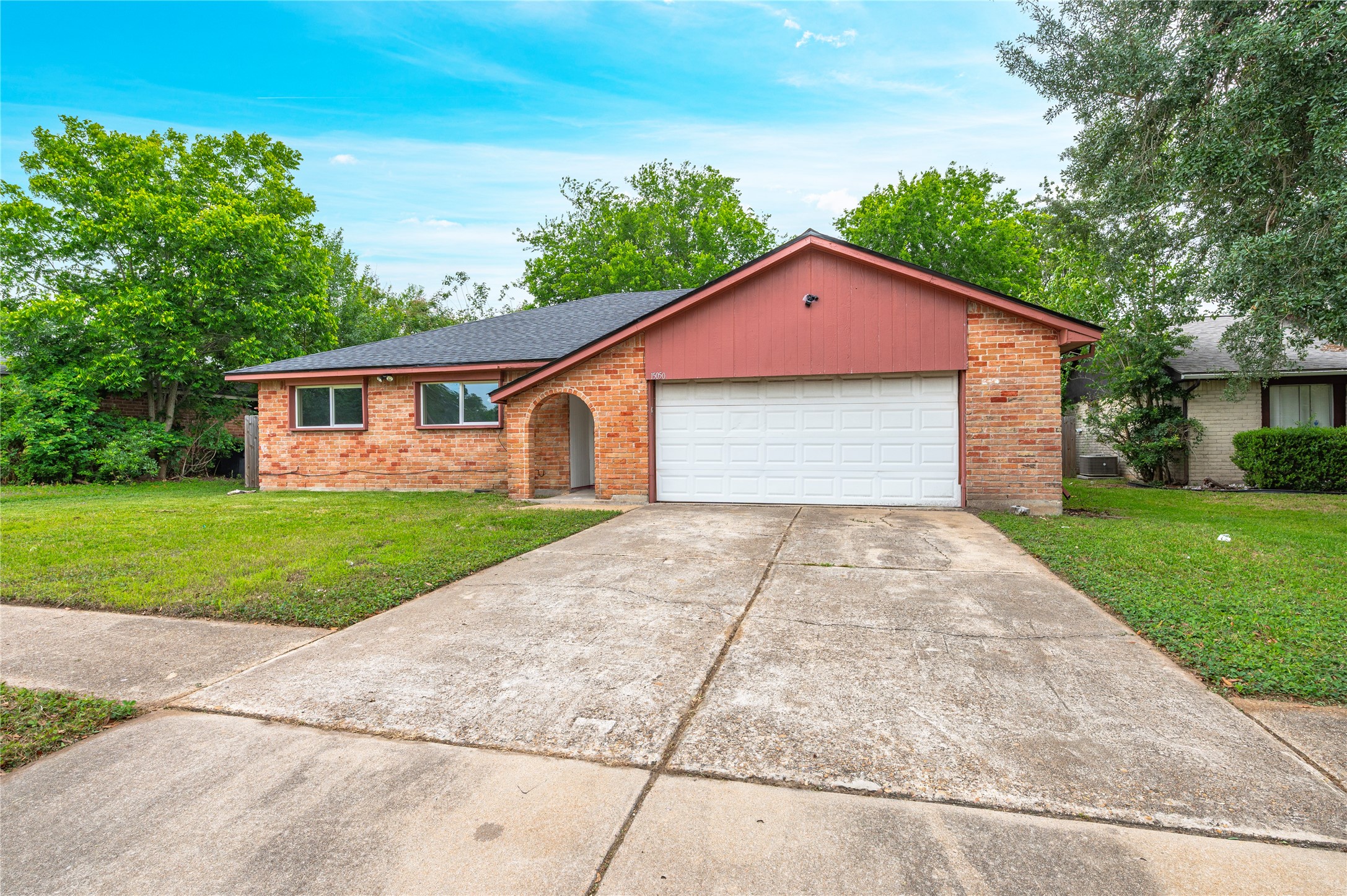 15050 Blueridge Road Missouri City, TX 77489 - Photo 2 of 30 a front view of a house with yard