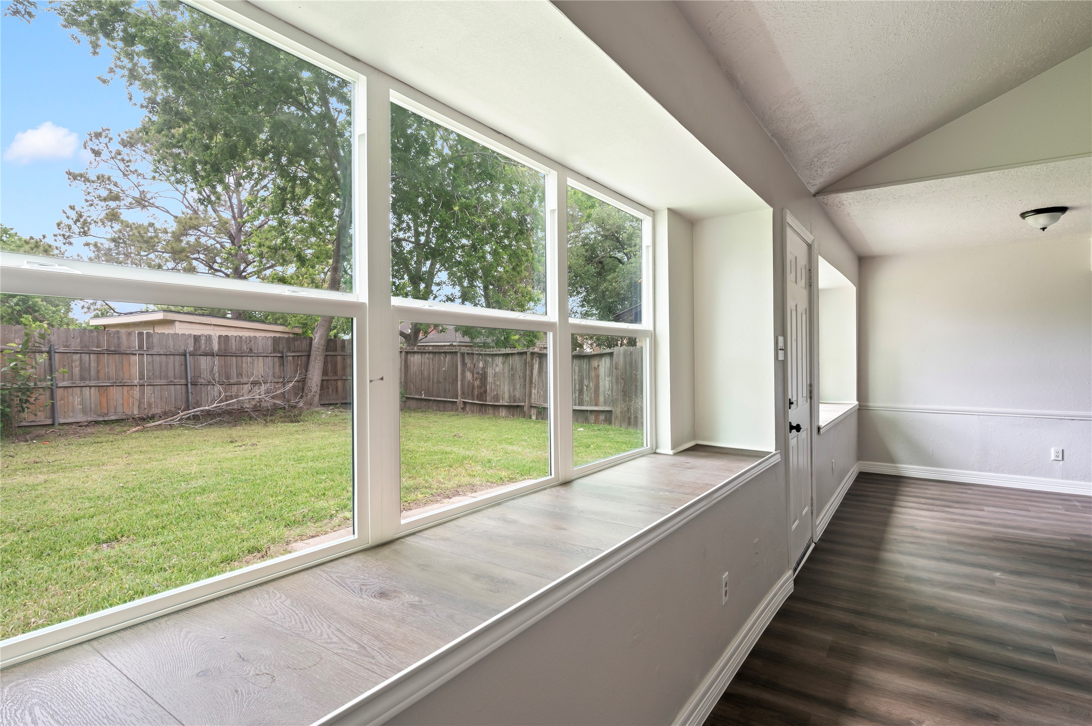 15050 Blueridge Road Missouri City, TX 77489 - Photo 7 of 30 a view of outdoor space with backyard and windows