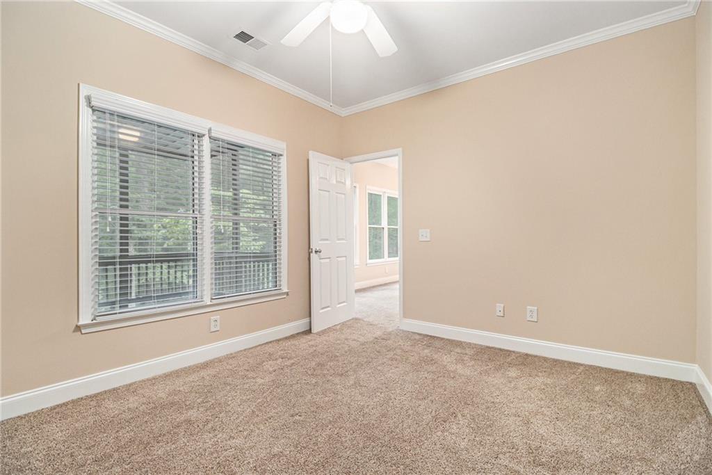 58 Poplar Circle Jasper, GA 30143 - Photo 20 of 31 a view of an empty room with a window
