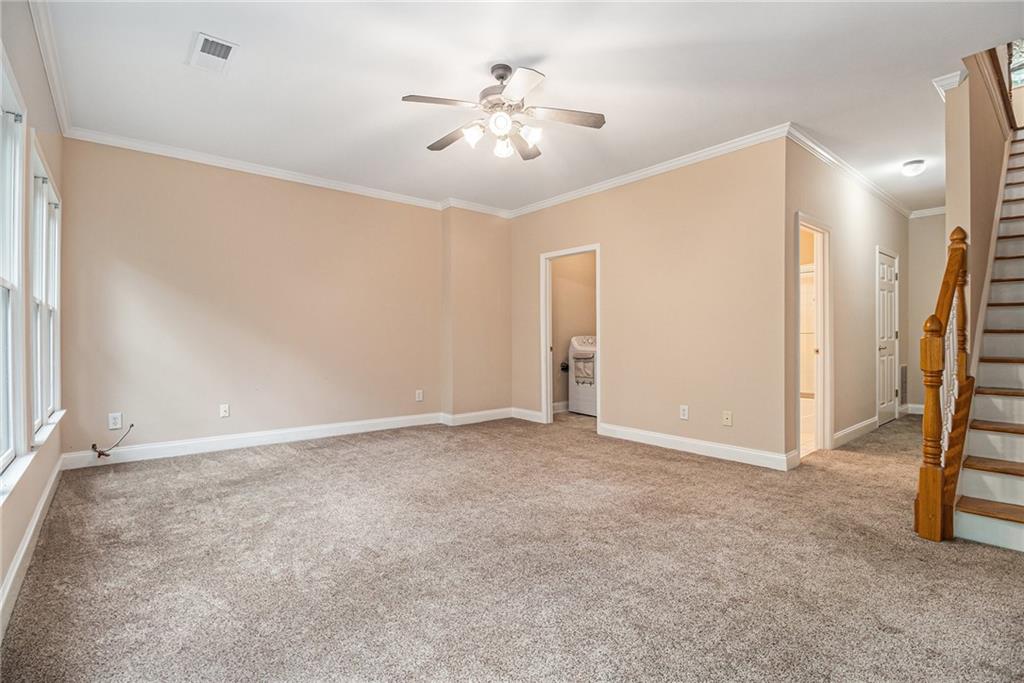 58 Poplar Circle Jasper, GA 30143 - Photo 22 of 31 a view of an empty room with a ceiling fan