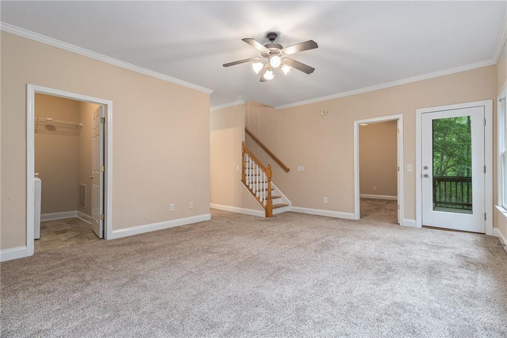 58 Poplar Circle Jasper, GA 30143 - Photo 23 of 31 a view of an empty room with chandelier fan