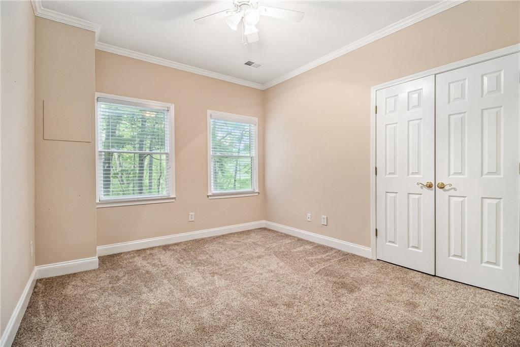 58 Poplar Circle Jasper, GA 30143 - Photo 25 of 31 an empty room with windows