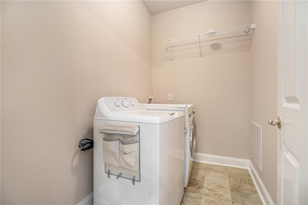 58 Poplar Circle Jasper, GA 30143 - Photo 28 of 31 a utility room with dryer and washer
