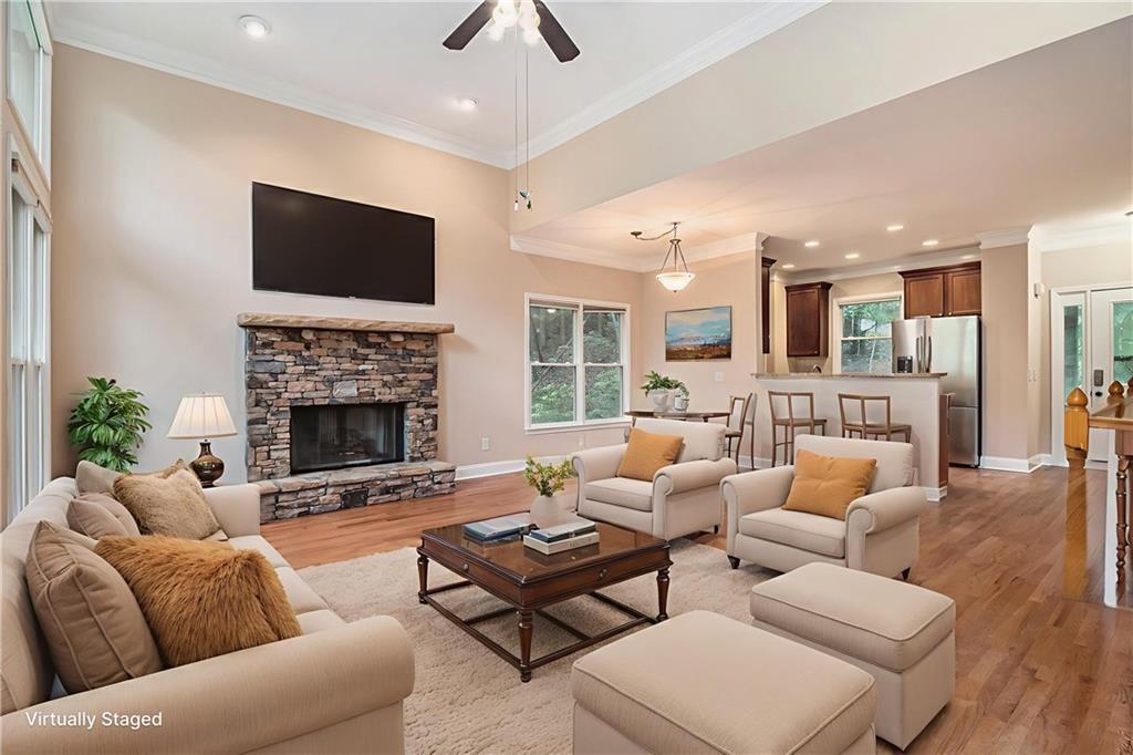 58 Poplar Circle Jasper, GA 30143 - Photo 5 of 31 a living room with furniture fireplace and a flat screen tv