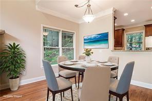 58 Poplar Circle Jasper, GA 30143 - Photo 10 of 31 a view of a dining room with furniture window and wooden floor