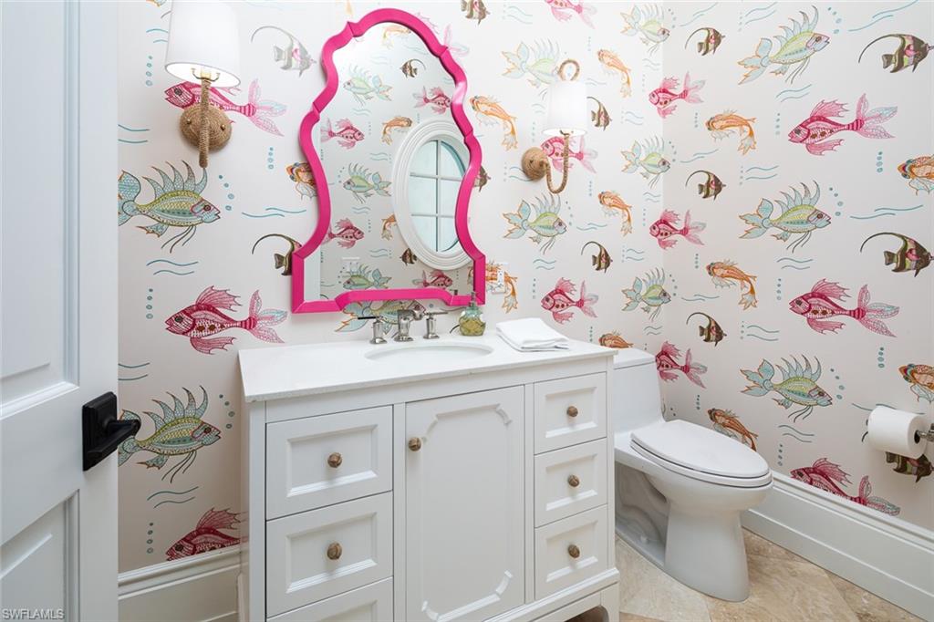 2595 Half Moon Walk Naples, FL 34102 - Photo 21 of 48 a bathroom with a sink toilet and vanity