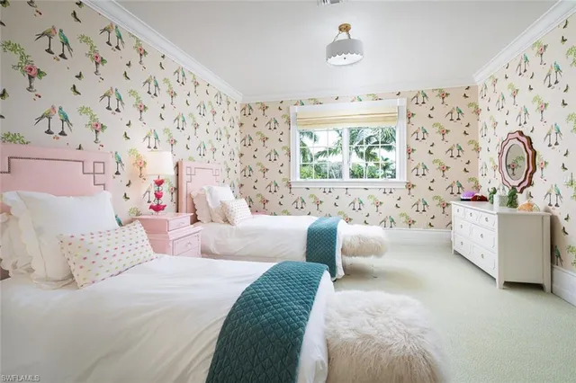 a bedroom with bed and a couch