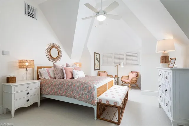 a bedroom with bed and window