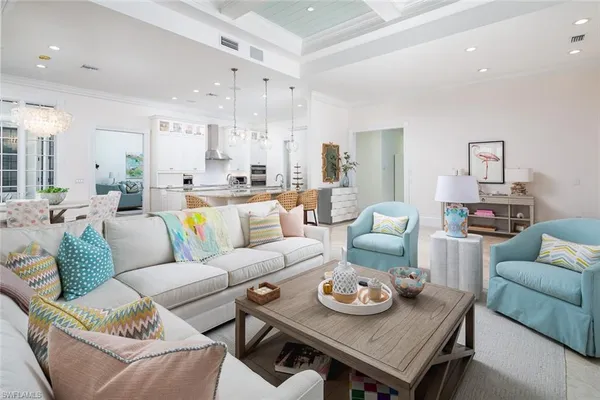 a living room with furniture and a table