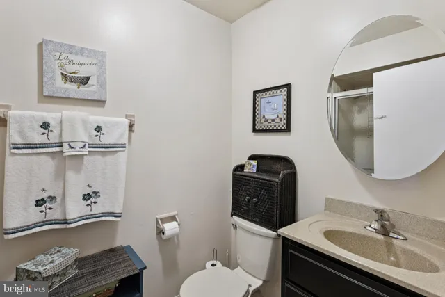 a bathroom with a shower and a mirror