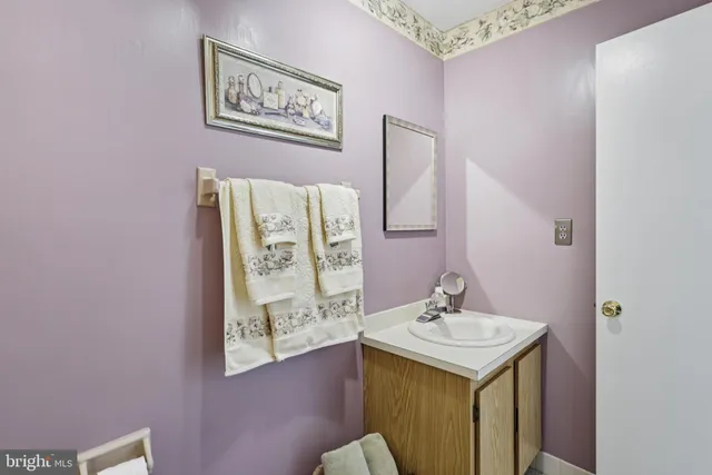 a view of a balcony with wooden floor