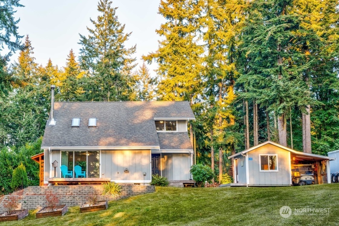 83-B Port Gardner Drive Hat Island, WA 98201 - Photo 1 of 33 front view of house with a yard