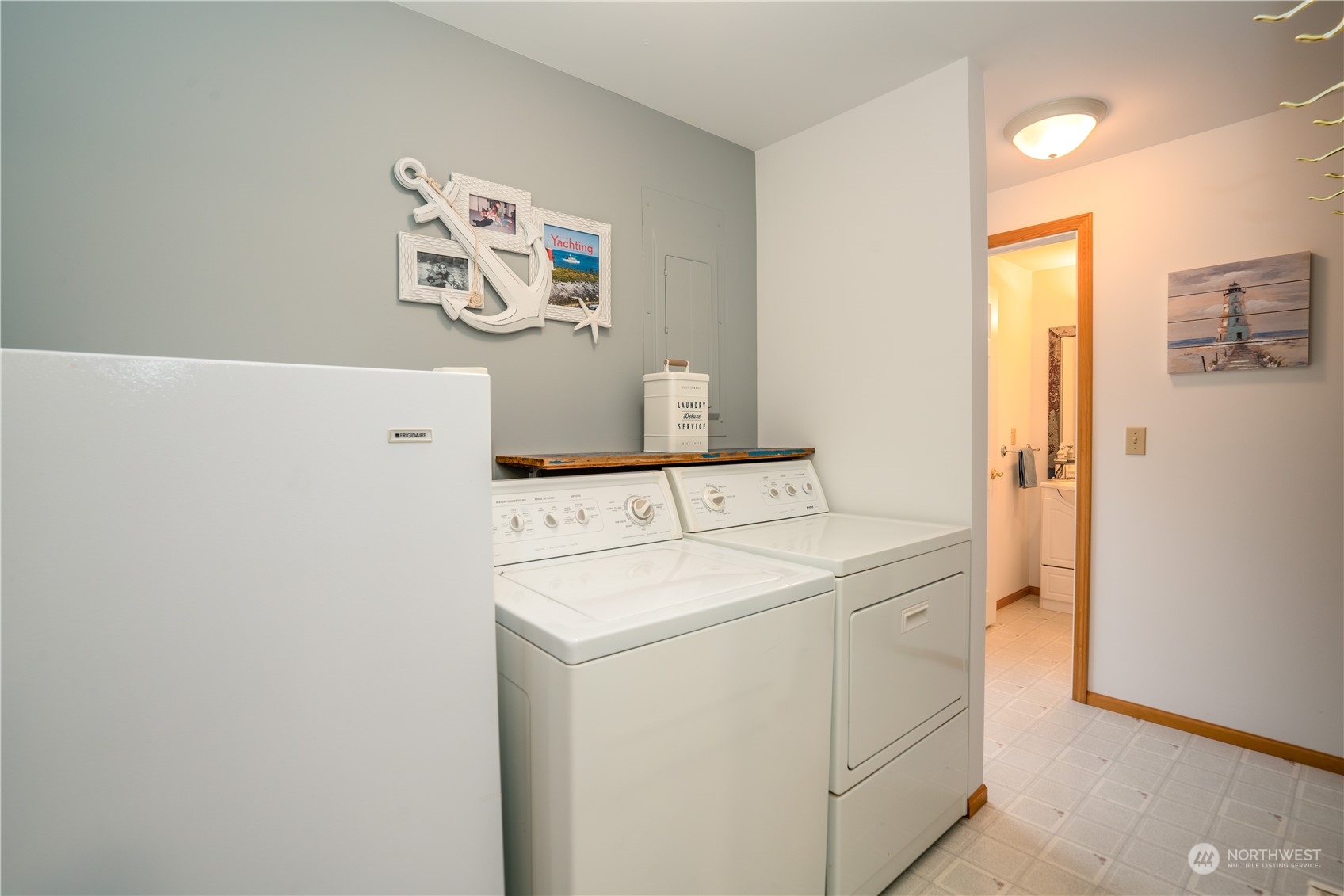 83-B Port Gardner Drive Hat Island, WA 98201 - Photo 18 of 33 a utility room with dryer and washer