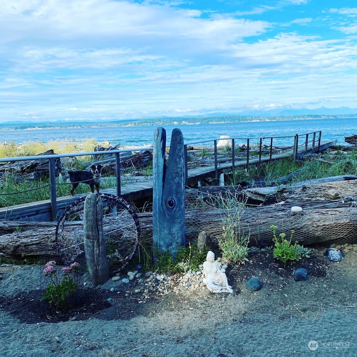 83-B Port Gardner Drive Hat Island, WA 98201 - Photo 25 of 33 a view of a yard and an chairs