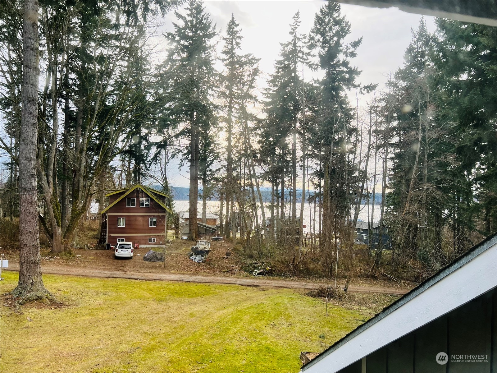 83-B Port Gardner Drive Hat Island, WA 98201 - Photo 4 of 33 a view of swimming pool with trees