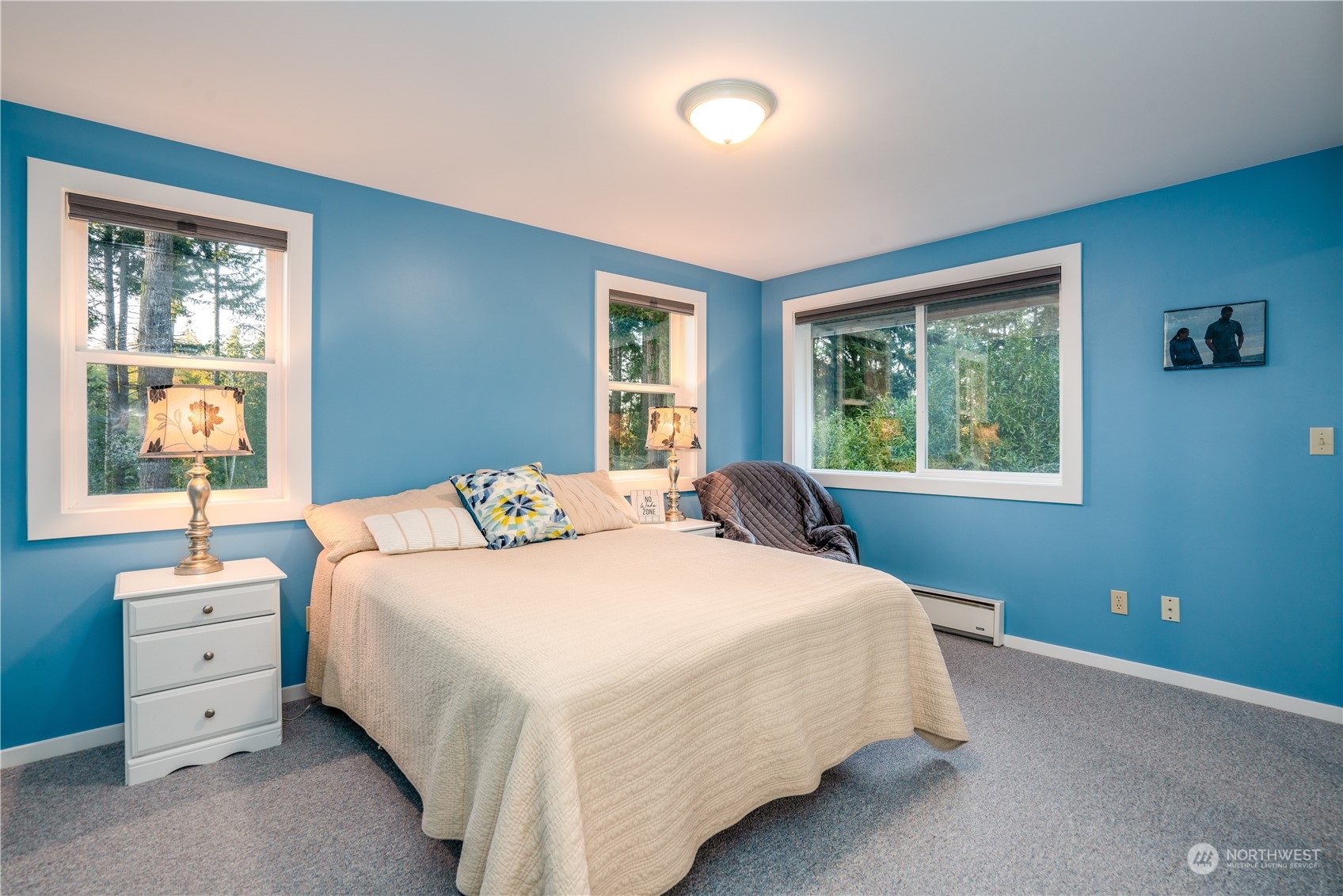 83-B Port Gardner Drive Hat Island, WA 98201 - Photo 7 of 33 a bedroom with a bed and a window