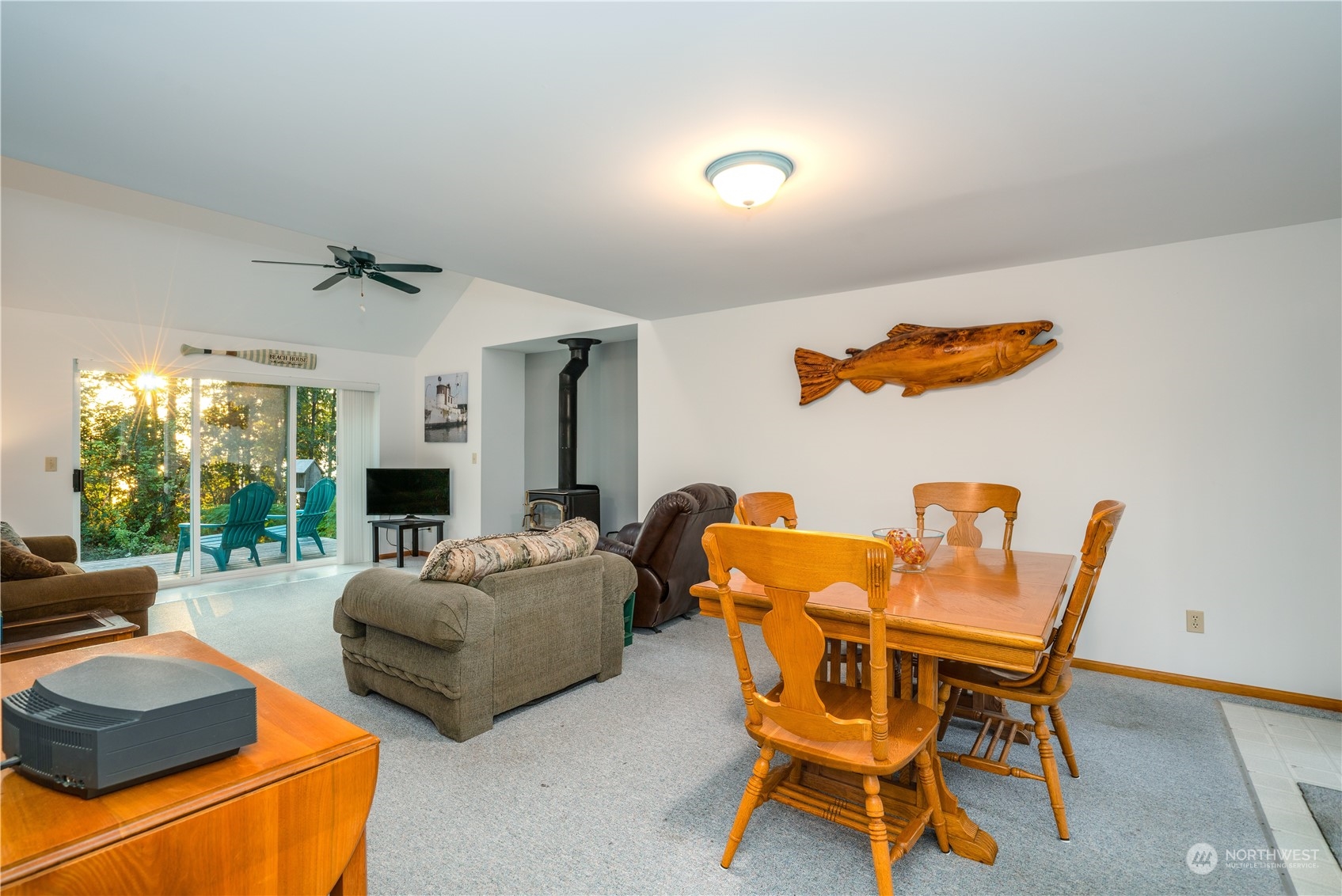 83-B Port Gardner Drive Hat Island, WA 98201 - Photo 9 of 33 a living room with furniture and a flat screen tv