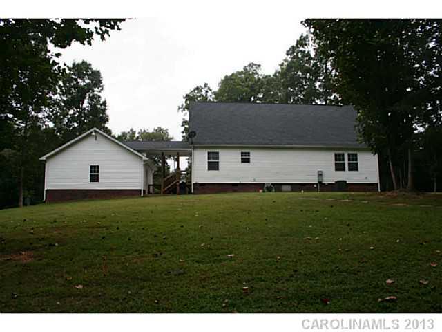 17300 Cool Springs Road Cleveland, NC 27013 - Photo 14 of 14 a outdoor view of a house with a backyard