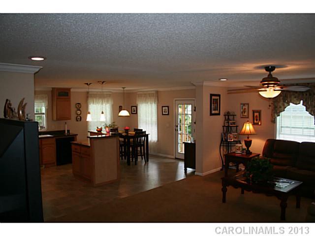 17300 Cool Springs Road Cleveland, NC 27013 - Photo 4 of 14 a view of a dining room with furniture