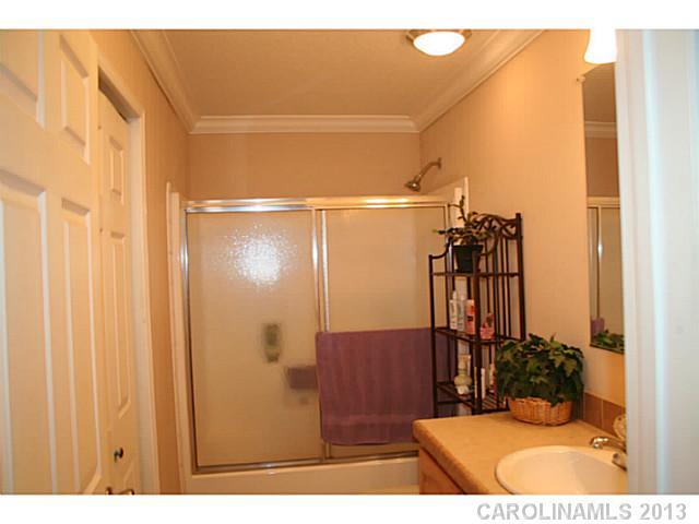 17300 Cool Springs Road Cleveland, NC 27013 - Photo 6 of 14 a bathroom with a mirror